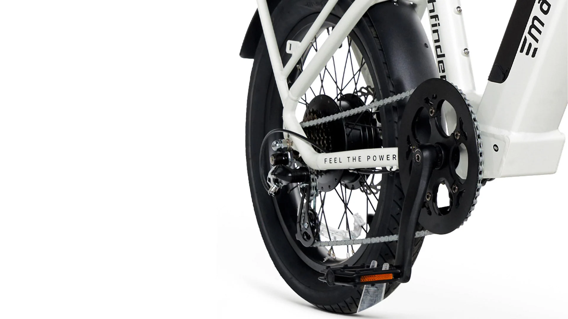 Magnum electric bike, drivetrain and wheel photographed against a light background