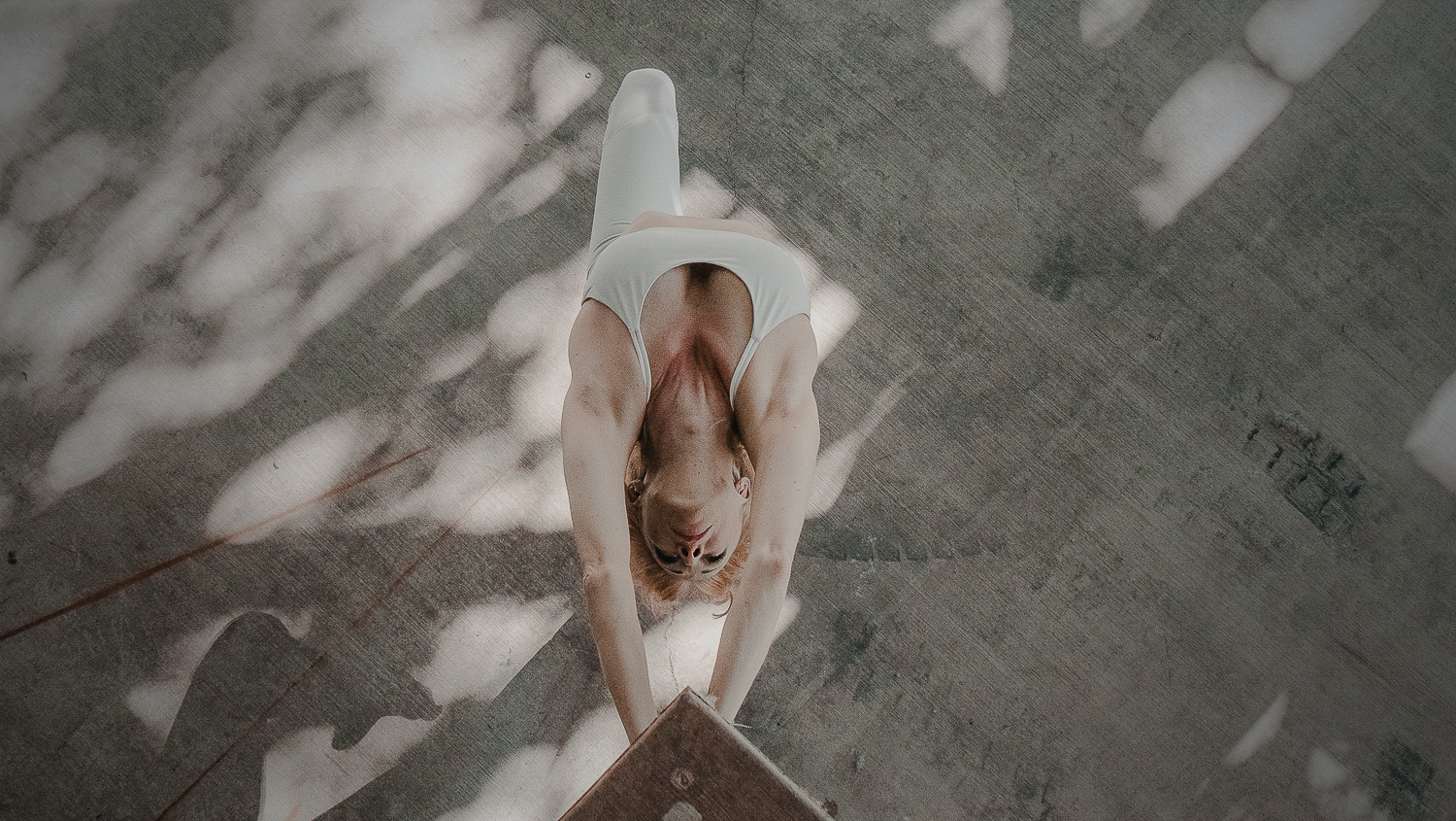 Fabletics editorial campaign, an athlete stretching in natural light, seen from above